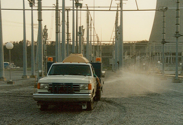 NaturChem spray truck at industrial plant site